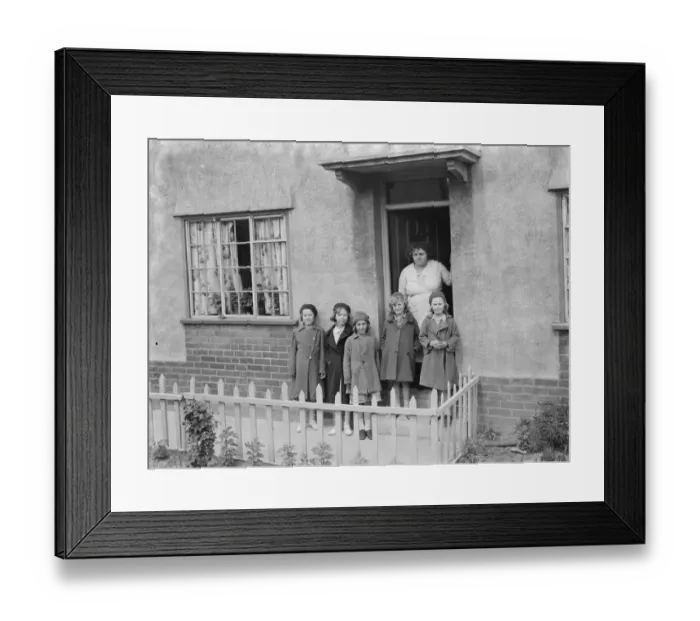 Framed Print : Mrs W E Wakefield with her daughters at the front of their home in Gravesend, Kent Framed Print : Mrs W E Wakefield with her daughters at the front of their home in Gravesend, Kent