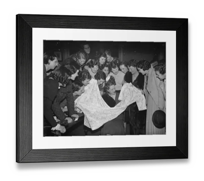 Framed Print : The Dartford Carnival Queen choosing a dress with her retinue. 6 April 1938 Framed Print : The Dartford Carnival Queen choosing a dress with her retinue. 6 April 1938