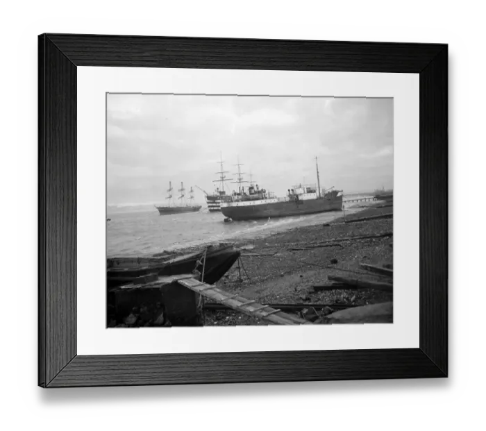 Framed Print : Shipping run aground on the shore in front of HMS Worcester and The Cutty Sark Framed Print : Shipping run aground on the shore in front of HMS Worcester and The Cutty Sark