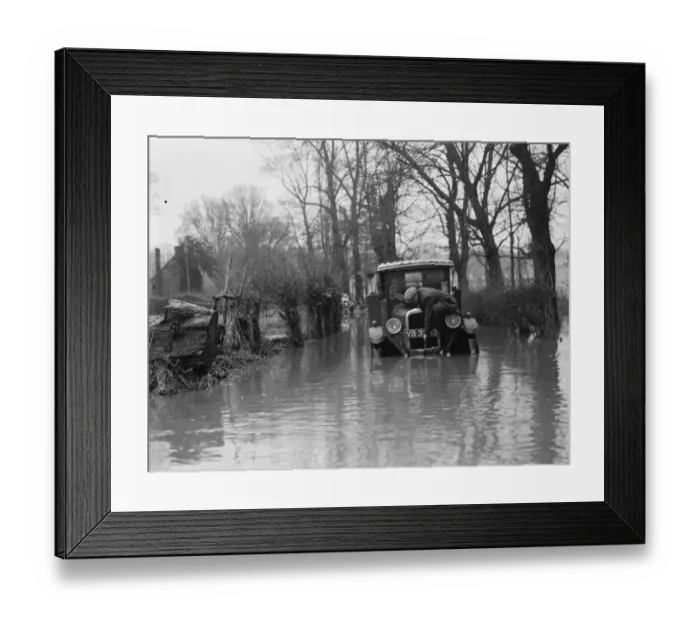 Framed Print : The village of Horton Kirby, Kent, where the river Darent has flooded. A stranded Framed Print : The village of Horton Kirby, Kent, where the river Darent has flooded. A stranded