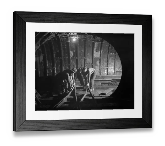 Framed Print : The Dartford tunnel men working the pipes. 1938 Framed Print : The Dartford tunnel men working the pipes. 1938