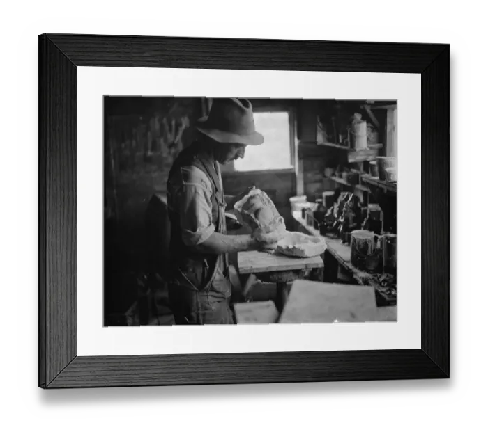 Framed Print : Pottery maker Mr Sadler filling sides of a rabbit mould with clay. 1938 Framed Print : Pottery maker Mr Sadler filling sides of a rabbit mould with clay. 1938