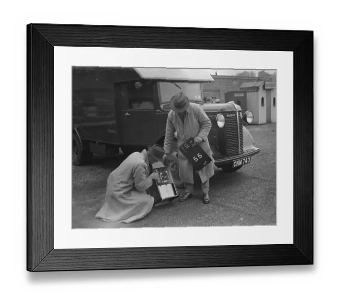 Framed Print : Men using a Bedford truck to set up the totalisators at Hurst Park Racecourse in Molesey Framed Print : Men using a Bedford truck to set up the totalisators at Hurst Park Racecourse in Molesey