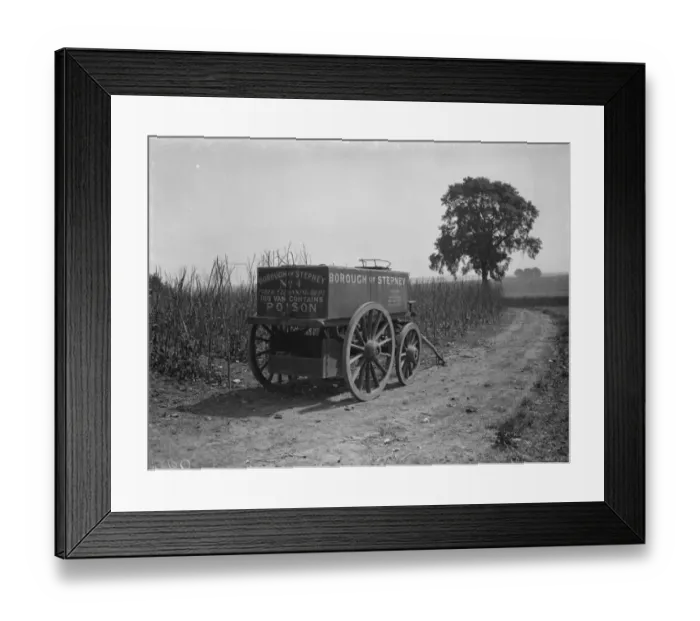Framed Print : Farmers disinfectant trailer from borough of Stepney at the side of a field Framed Print : Farmers disinfectant trailer from borough of Stepney at the side of a field