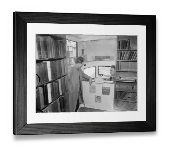 Framed Print : A woman visiting the Kent County mobile library. 1939
