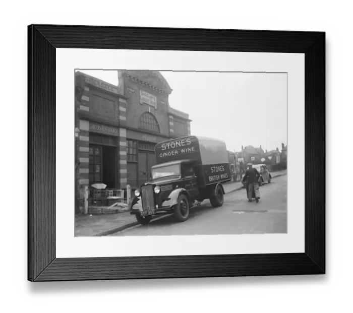 Framed Print : A Bedford truck from the Stones Ginger and Wine company, parked outside Robins Framed Print : A Bedford truck from the Stones Ginger and Wine company, parked outside Robins