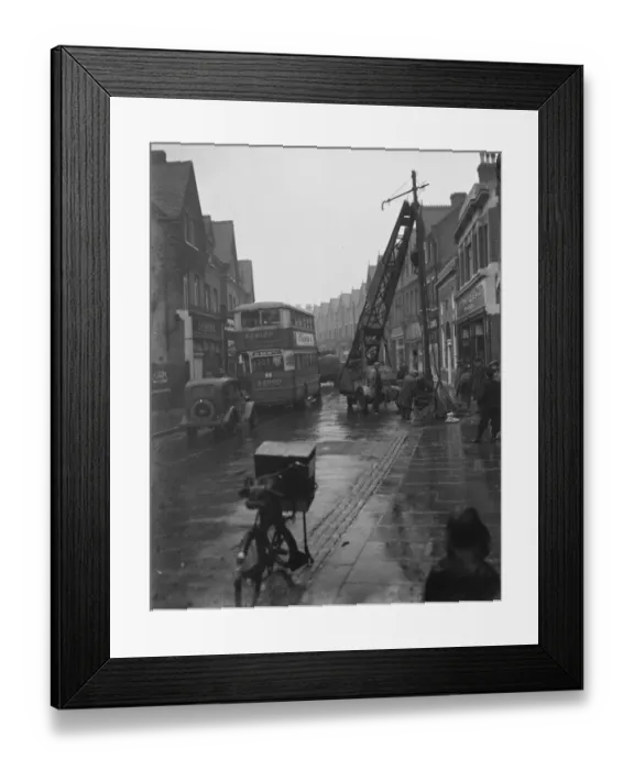 Framed Print : New lamp standards being set up in Sidcup, Kent. 1937 Framed Print : New lamp standards being set up in Sidcup, Kent. 1937
