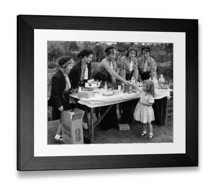 Framed Print : Wilmington Church Fete. Girl Guides on their stall selling chocolate and sweets Framed Print : Wilmington Church Fete. Girl Guides on their stall selling chocolate and sweets
