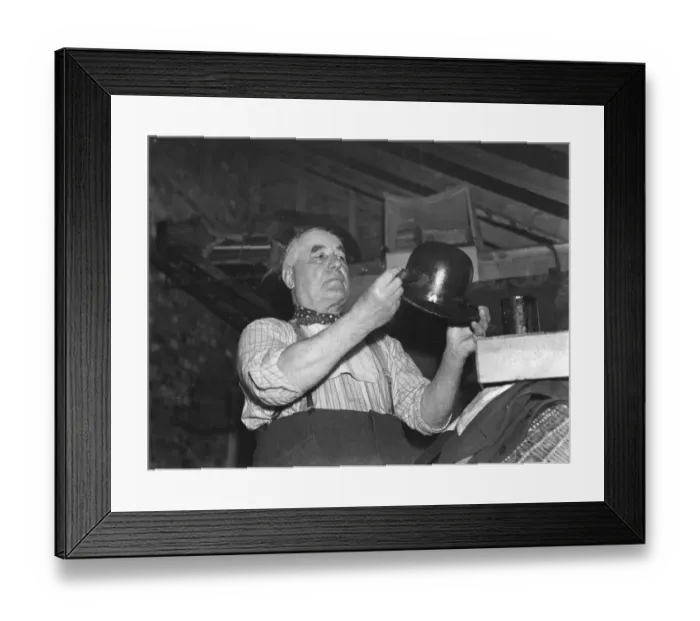Framed Print : Mr Charlie Hever painting tar onto a bowler hat in Eynsford, Kent. 1937 Framed Print : Mr Charlie Hever painting tar onto a bowler hat in Eynsford, Kent. 1937