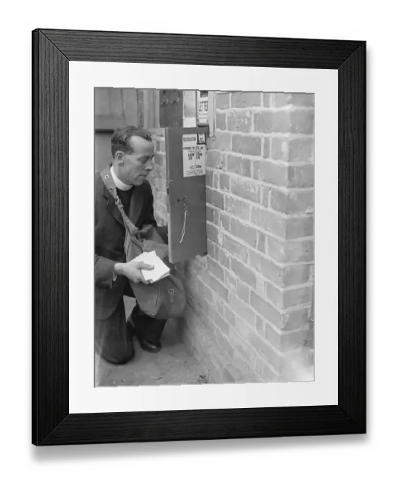 Framed Print : Mr J D Richards, who is acting as an emergency postman in Horsmonden, Kent, is