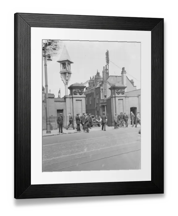 Framed Print : The entrance and bell at Woolwich Dockyard, London. 1939 Framed Print : The entrance and bell at Woolwich Dockyard, London. 1939