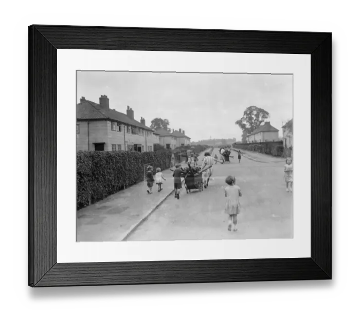 Framed Print : Children use prams to carry home firewood in Sidcup, Kent. 1938