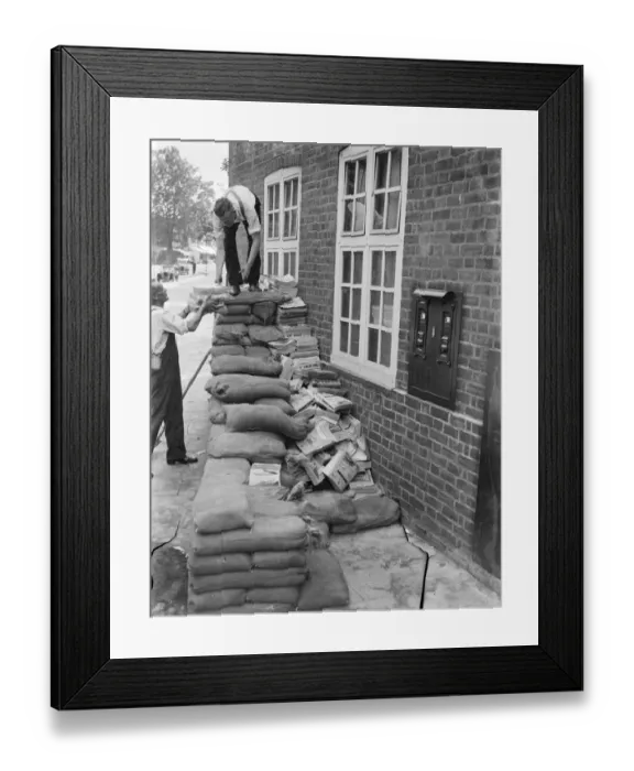 Framed Print : Sidcups General Post Office is being fortified with sandbags and telephone directories Framed Print : Sidcups General Post Office is being fortified with sandbags and telephone directories