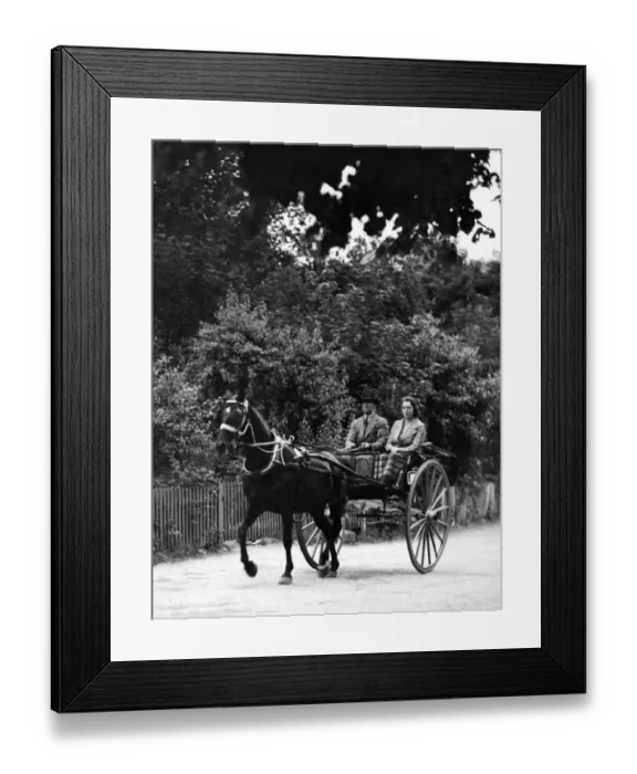 Framed Print : WWII. July 1940. Riding in a Pony and trap in a Kent village Framed Print : WWII. July 1940. Riding in a Pony and trap in a Kent village