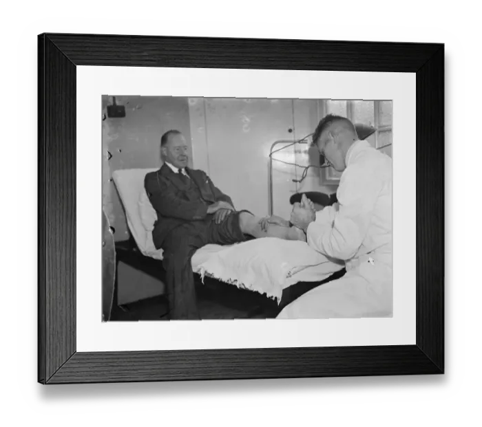 Framed Print : Gravesend hospital series. A patient is given light treatment. 1939 Framed Print : Gravesend hospital series. A patient is given light treatment. 1939