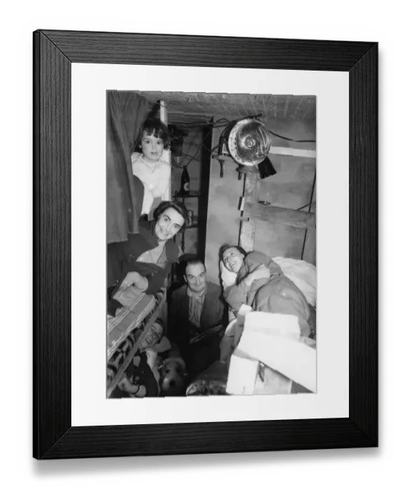 Framed Print : Family of five with their dog in an air raid shelter in Kent in WWII