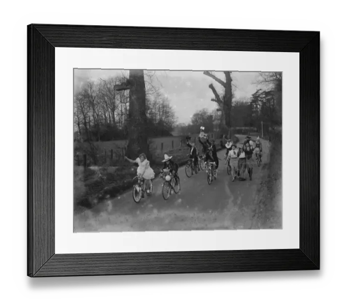Framed Print : Sidcup Touring Clubs : fancy dress. Riding bicycles down the road