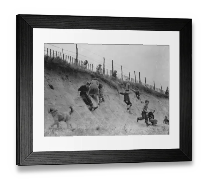 Framed Print : Children sliding down the bank. 1937 Framed Print : Children sliding down the bank. 1937