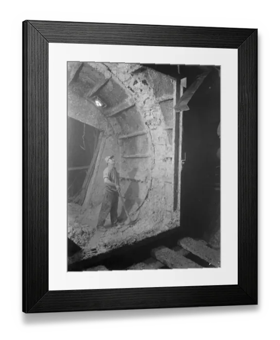 Framed Print : The completion of the pilot Dartford Tunnel. Miner, Joe Moon, works around Framed Print : The completion of the pilot Dartford Tunnel. Miner, Joe Moon, works around