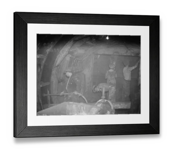 Framed Print : The construction of the Dartford Tunnel. Workmen by the shield and injecting cement Framed Print : The construction of the Dartford Tunnel. Workmen by the shield and injecting cement