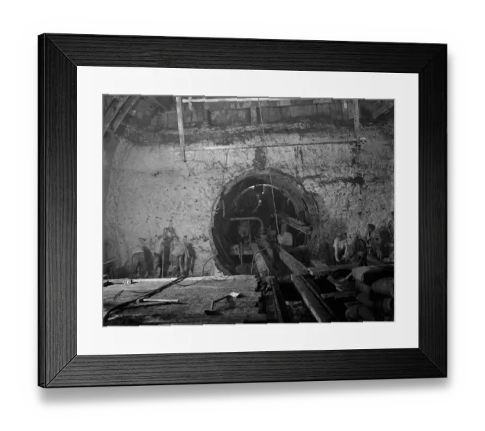 Framed Print : The construction of the Dartford Tunnel. Workers building the main tunneling shield