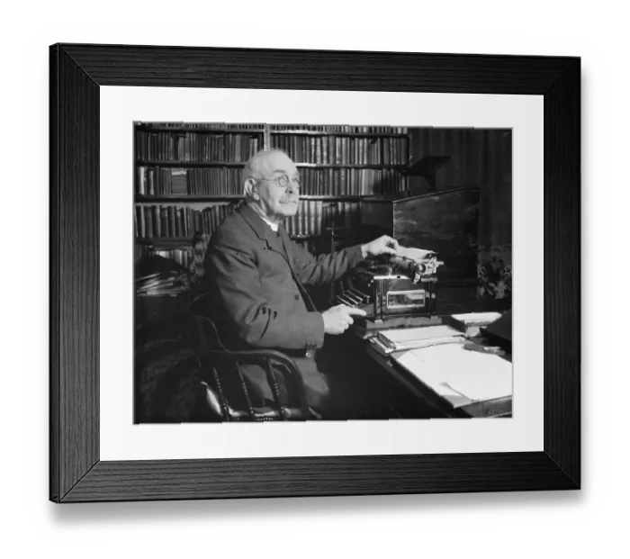 Framed Print : The Reverand Mackintosh of Horns Cross, Kent, sitting at his typewriter Framed Print : The Reverand Mackintosh of Horns Cross, Kent, sitting at his typewriter