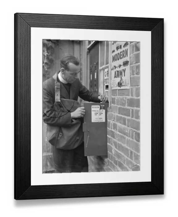 Framed Print : Mr J D Richards, who is acting as an emergency postman in Horsmonden, Kent, is Framed Print : Mr J D Richards, who is acting as an emergency postman in Horsmonden, Kent, is