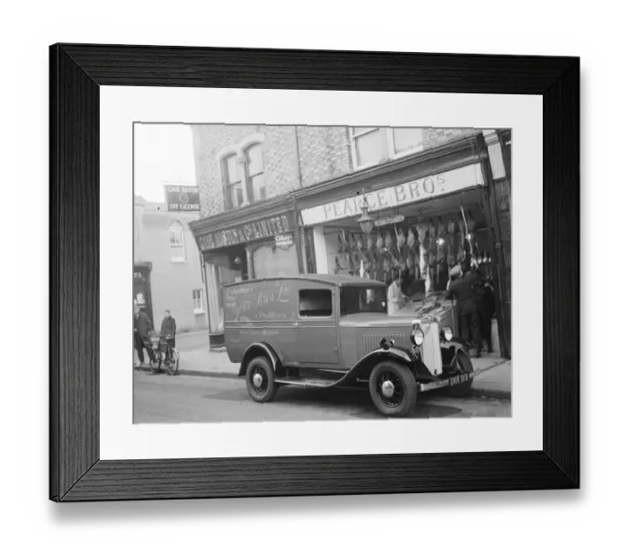 Framed Print : A Bedford truck belonging to Pearce Bros Ltd, the fishmongers and poulterers, parked Framed Print : A Bedford truck belonging to Pearce Bros Ltd, the fishmongers and poulterers, parked