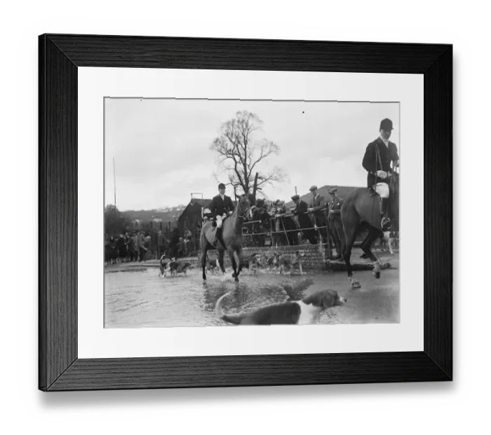 Framed Print : The Royal Artillery Drag Hunt cross a flooded street in Eynsford, Kent Framed Print : The Royal Artillery Drag Hunt cross a flooded street in Eynsford, Kent