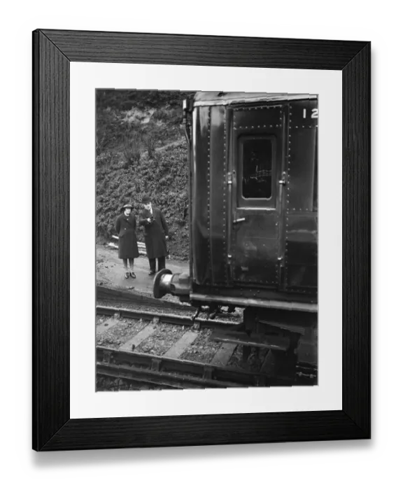 Framed Print : Testing electrified railway lines by steam train in Swanley, Kent. 1938 Framed Print : Testing electrified railway lines by steam train in Swanley, Kent. 1938