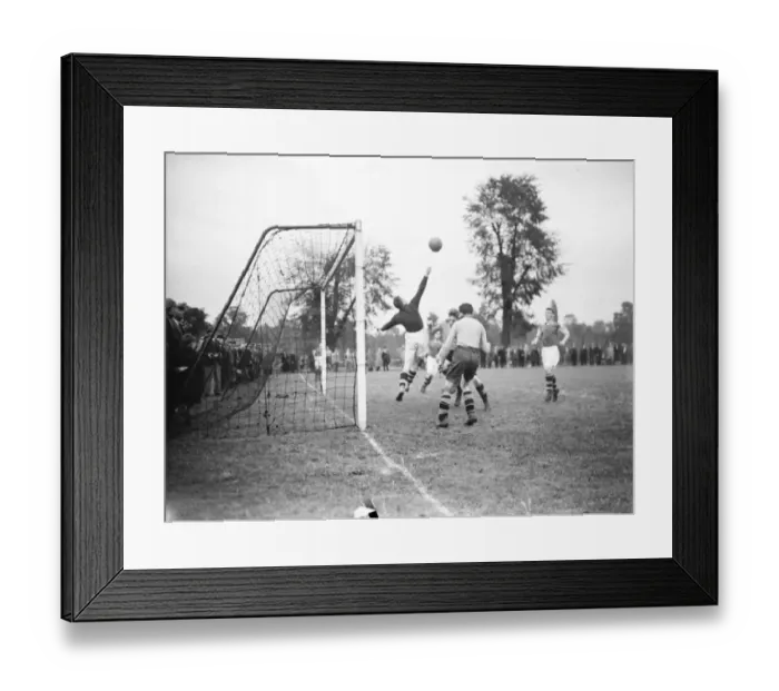 Framed Print : A football match in Swanley, Kent. Goalkeeper reaches for the ball Framed Print : A football match in Swanley, Kent. Goalkeeper reaches for the ball