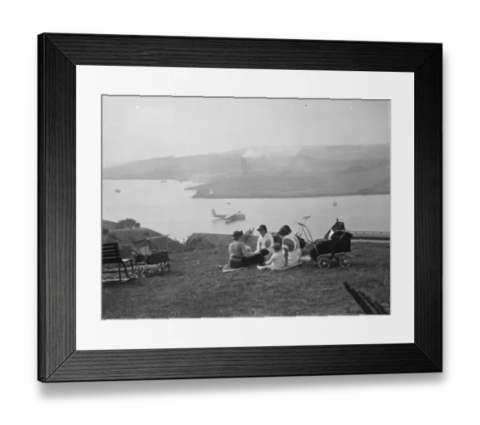 Framed Print : Nursemaids in Rochester, Kent, have a good view of the flying boat tests on Framed Print : Nursemaids in Rochester, Kent, have a good view of the flying boat tests on
