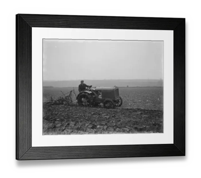 Framed Print : A farmer on a tractor ploughing a field near Swanley, Kent. 1936 Framed Print : A farmer on a tractor ploughing a field near Swanley, Kent. 1936