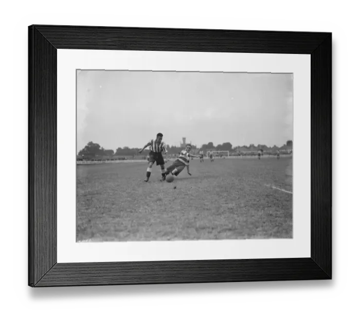Framed Print : Footballers at Dartford. Two players compete for the ball. 1936 Framed Print : Footballers at Dartford. Two players compete for the ball. 1936