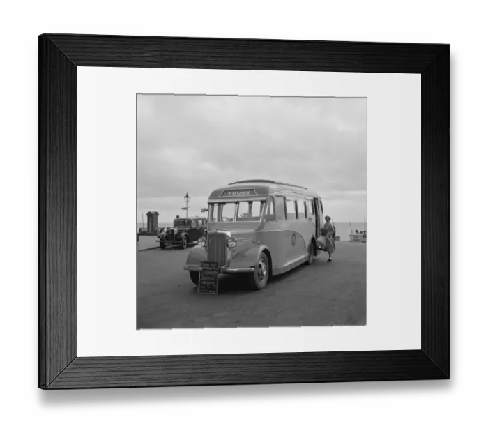 Framed Print : Swanage tour coache on the sea front in Swanage, Dorset. 1936 Framed Print : Swanage tour coache on the sea front in Swanage, Dorset. 1936