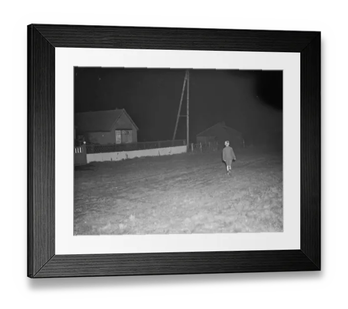 Framed Print : A boy, walking down Church Road in Kingsdown, Kent. 12 December 1938 Framed Print : A boy, walking down Church Road in Kingsdown, Kent. 12 December 1938