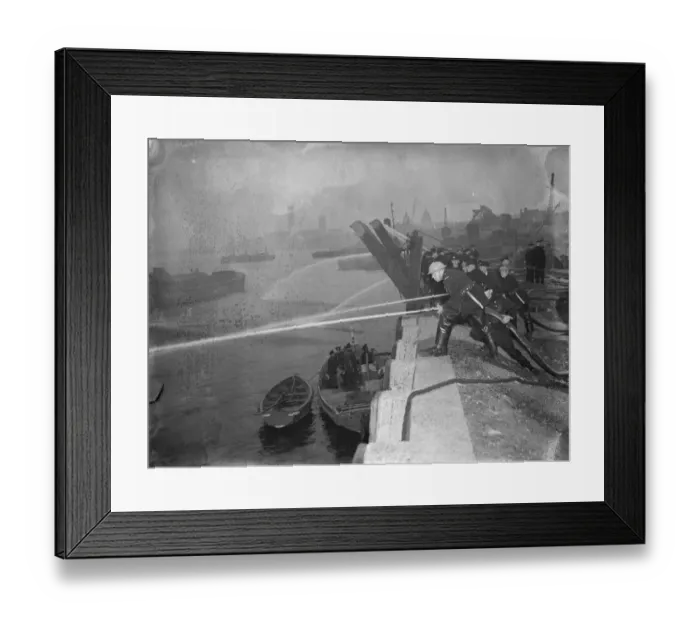 Framed Print : The Auxiliary Fire Service during a hose practice drill by the River Thames at Greenwich Framed Print : The Auxiliary Fire Service during a hose practice drill by the River Thames at Greenwich