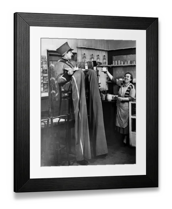 Framed Print : After patrolling the streets of Sidcup, Henry, a professional stilt walker Framed Print : After patrolling the streets of Sidcup, Henry, a professional stilt walker