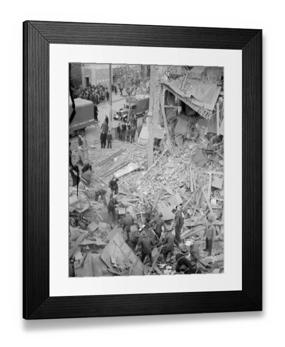 Framed Print : 9 November 1940 A rescue party look for survivors in the bomb damage of a collapsed Framed Print : 9 November 1940 A rescue party look for survivors in the bomb damage of a collapsed