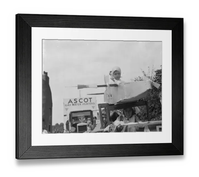 Framed Print : The Gravesend Carnival procession in Kent. A young aviator on his float Framed Print : The Gravesend Carnival procession in Kent. A young aviator on his float