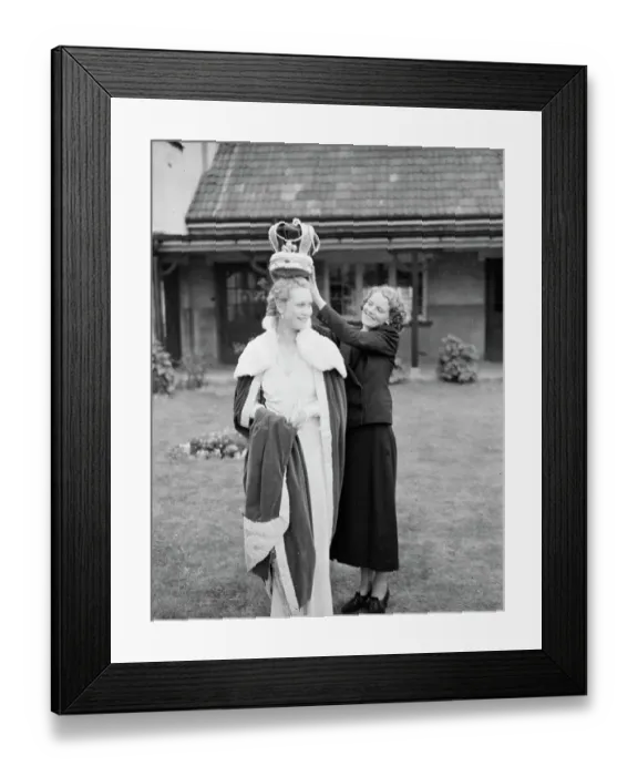 Framed Print : The Dartford Carnival queen trys on the queens gown. 1938 Framed Print : The Dartford Carnival queen trys on the queens gown. 1938