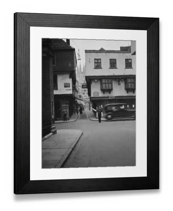 Framed Print : A traffic policeman on duty in Canterbury High Street, Kent. 1937 Framed Print : A traffic policeman on duty in Canterbury High Street, Kent. 1937