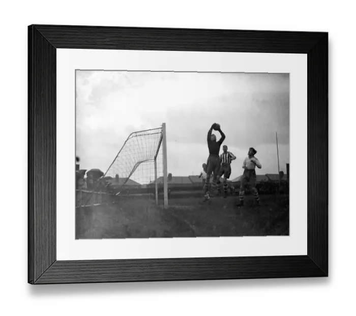 Framed Print : The goalkeeper makes a save at the Dartford V Enfield football match. 10 November 1934
