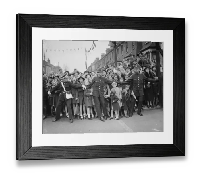 Framed Print : Crowds stand at the side of the road and cheer for the Duchess of Kent