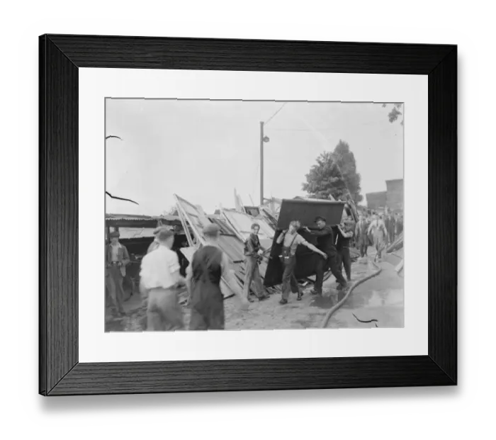 Framed Print : Locals help with the clear up following the timber yard fire in Bexleyheath, Kent Framed Print : Locals help with the clear up following the timber yard fire in Bexleyheath, Kent