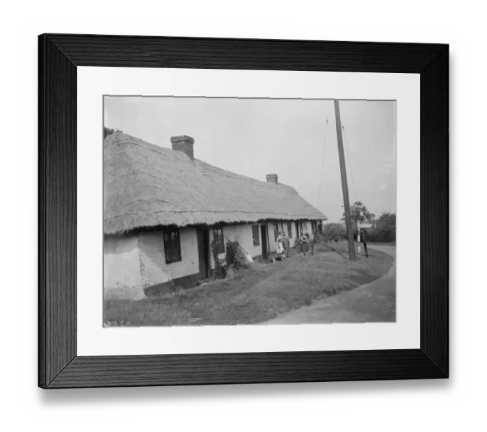Framed Print : A telephone pole in the front garden of a row of cottages in Bredger, Kent Framed Print : A telephone pole in the front garden of a row of cottages in Bredger, Kent