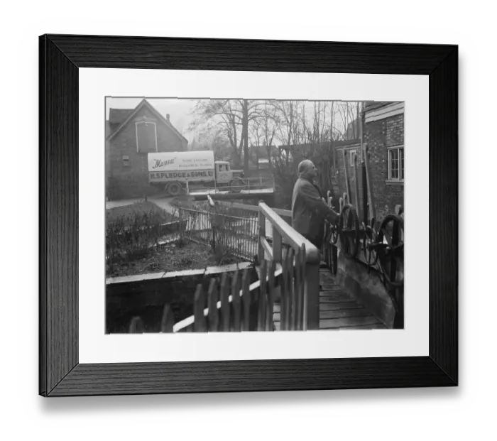 Framed Print : S O Garnham at the water powered, flour East Hill Mill in Ashford, Kent, which