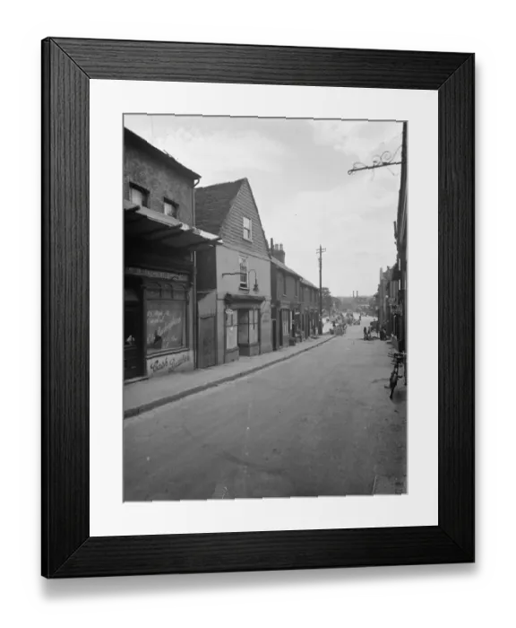 Framed Print : A view of the buildings on Cray Ford high street that are soon to be demolished Framed Print : A view of the buildings on Cray Ford high street that are soon to be demolished