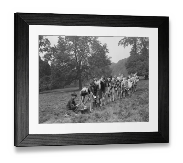Framed Print : Scouts at Bexley scouts camp. The scouts line up to get a drink. 1937 Framed Print : Scouts at Bexley scouts camp. The scouts line up to get a drink. 1937