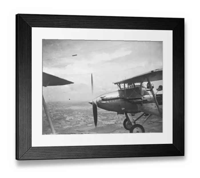 Framed Print : A Hawker Hart of No. 23 Squadron RAF flying in formation over the Medway area in Kent Framed Print : A Hawker Hart of No. 23 Squadron RAF flying in formation over the Medway area in Kent